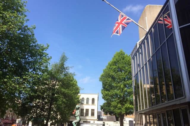 The Union Jack flying half mast at Hove Town Hall
