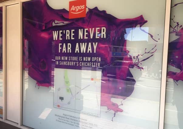 The poster plastered over the closed Argos which contains the error