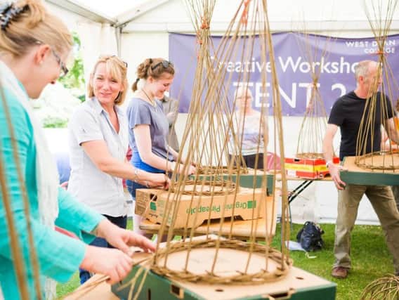 Hands-on willow weaving workshop at the West Dean Arts and Craft Festival. Credit Christopher Ison