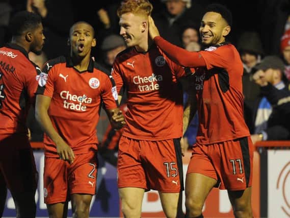 STAYING ON: Crawley Town defender Josh Yorwerth scores against Newport County.
Picture by Jon Rigby