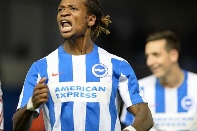 Gaetan Bong celebrates a Brighton goal last season. Picture by Phil Westlake (PW Sporting Photography)