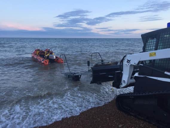 Hastings lifeboat launch. Photo courtesy of Hastings RNLI. SUS-170531-095329001