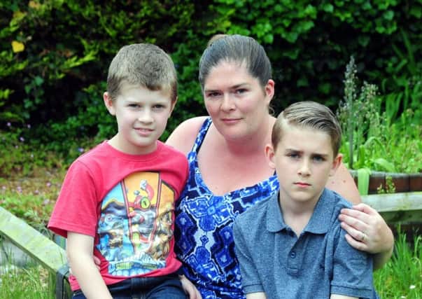 Darleen Gaffney with her children Kyle, ten and Callum, eight. Picture: Kate Shemilt