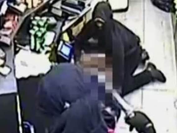 Two men armed with a Samurai sword and a large knife appeared to have attacked staff.