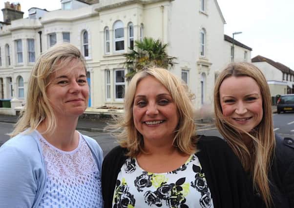 Louise Gisbey, Sarah Farr and Sam Walker from the Safe in Sussex domestic abuse charity outside the Amber House women's refuge in New Road, Littlehampton. Picture: Stephen Goodger
