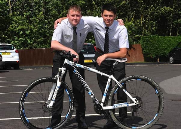Lee Winskill (left) and Sam Raw are preparing for their Paris cycle challenge with colleague Chris Cavell. Picture: Stephen Goodger