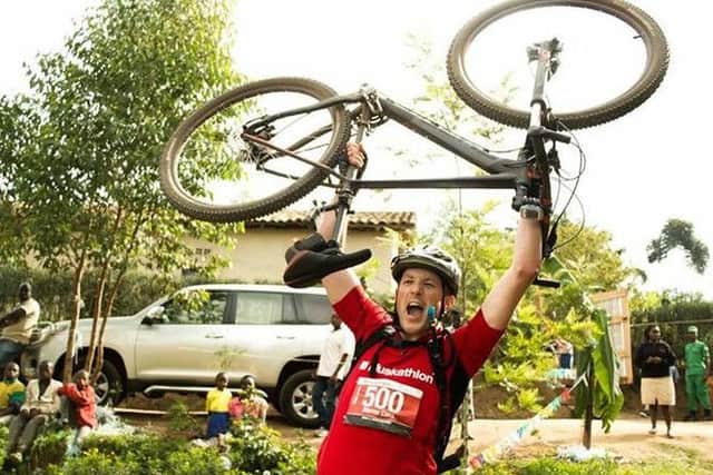 Steve Case from Rustington celebrates completing the 120km bike ride