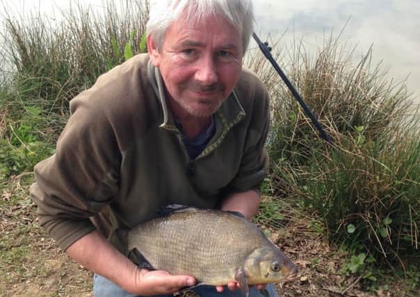 Tim Nudds with a bream caught at Petworth Park