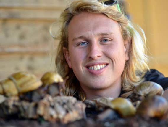 Deano Macmillan with his African land snails