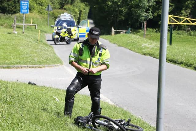 The cyclist was rushed to hospital after falling off his bike and seriously injuring himself. Picture: Eddie Mitchell