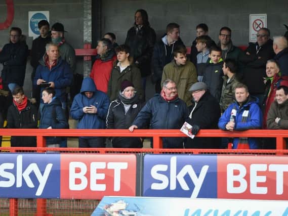 Crawley Town fans watching Reds take on Hartlepool. Picture by Phil Westlake (PW Sporting Photography)