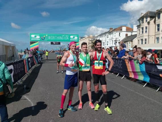 Worthing 10k race winner Jack Leitch (centre), second-placed finisher Andrew Mccaskill (left) and this year's third place Kevin Rojas (right)