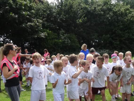 Children at Kingsham Primary School ran 2km to raise money for Cancer Research. Picture courtesy of Kingsham Primary