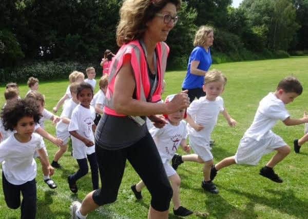 Members of staff and the PTA were on hand to support the children as they ran. Picture courtesy of Kingsham Primary