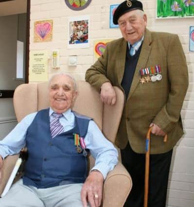 Bill Goldstone (seated) and James Pyett at Mais House SUS-170506-132903001