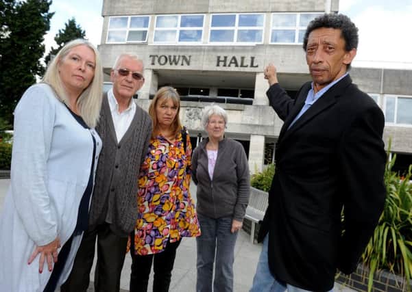 Cllrs Kim Jaggard, Bob Burgess, Tina Belben, and Brenda Burgess with Brian Osterreicher, protest to save Crawley Town Hall. Pic Steve Robards SR1712302 SUS-170206-180541001