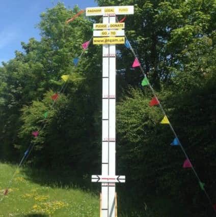 The fundraising post in the village showing more than Â£1,000 has been raised of the Â£5,000 target