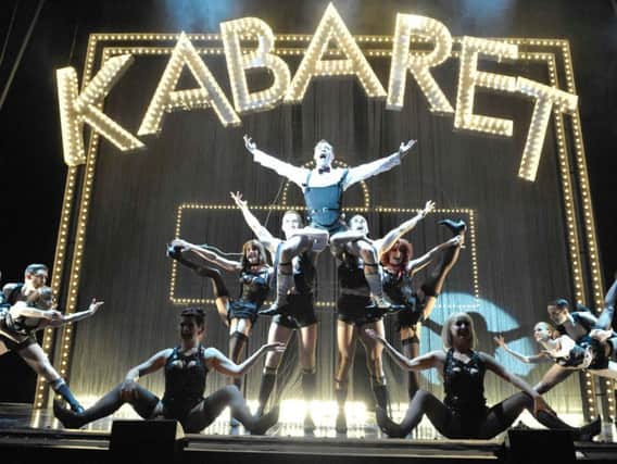 Will Young as Emcee and the Company in Cabaret    Photographer Keith Patt