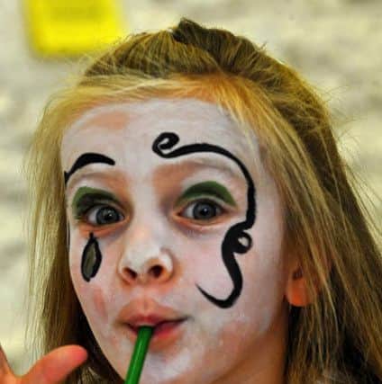 Four-year-old Lily Smart had her face painted at the Children's Extravaganza. Picture: Stephen Goodger
