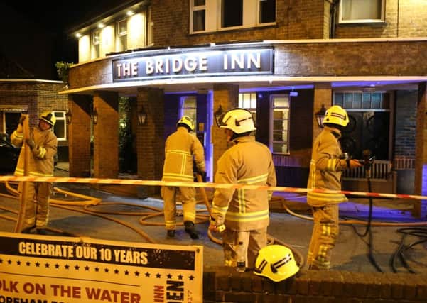 Firefighters used breathing apparatus to deal with the fire. Pictures: Eddie Mitchell