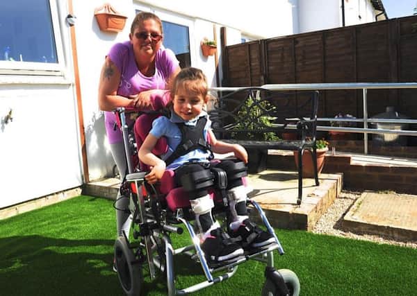 Angela and Gabby Scott in the new garden. Picture: Stephen Goodger