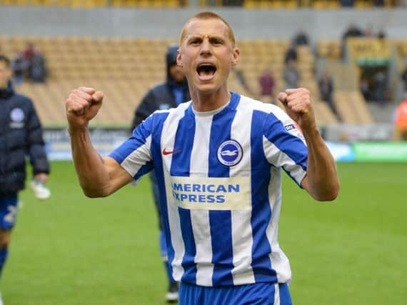 Steve Sidwell celebrates Albion's win at Wolves in April. Picture by Phil Westlake (PW Sporting Photography)