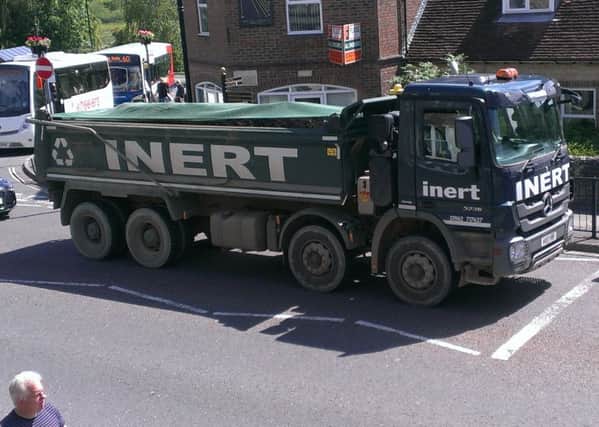 An Inert lorry carrying waste through the centre of Midhurst to the Pendean quarry.