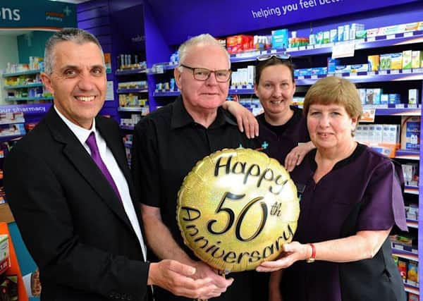 Dennis Jarvis is celebrating 50 years working at Rowlands Pharmacy in Lancing