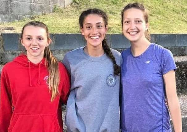 Three of Hastings Athletic Club's young talents at the Withdean Stadium - Evie Clements, Maya Ramnarine and Harmony Cooper.