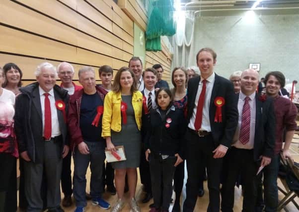 Labour candidate for Crawley Tim Lunnon, with party supporters