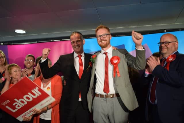 Hove's Peter Kyle and Brighton Kemptown's Lloyd Russell-Moyle celebrate Labour's election success in the city, with city council leader Warren Morgan