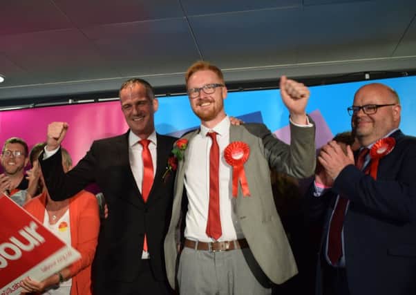 Hove's Peter Kyle and Brighton Kemptown's Lloyd Russell-Moyle celebrate Labour's election success in the city, with city council leader Warren Morgan