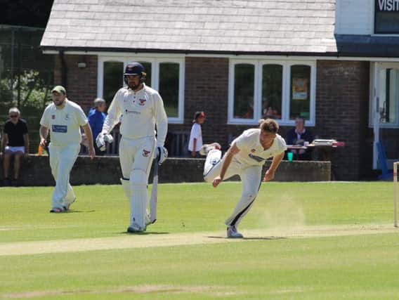 James Pearce bowling v Mayfield
