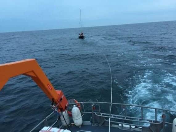 The lifeboat towed the vessel back to safety SUS-171206-100243001
