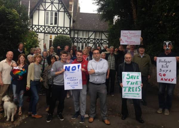 Cllr Rob Lee with residents on Upper Maze Hill protesting the now withdrawn Park Beck application. SUS-171206-113104001