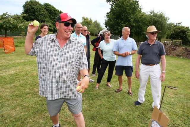 Taking aim at Earnley Fete. Photo by Derek Martin DM17627941a