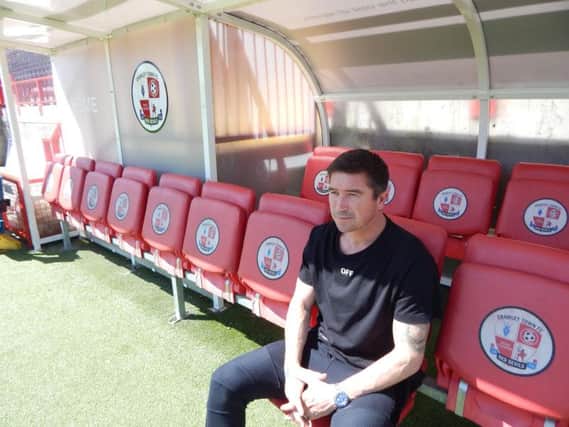 Harry Kewell in the Crawley Town dugout