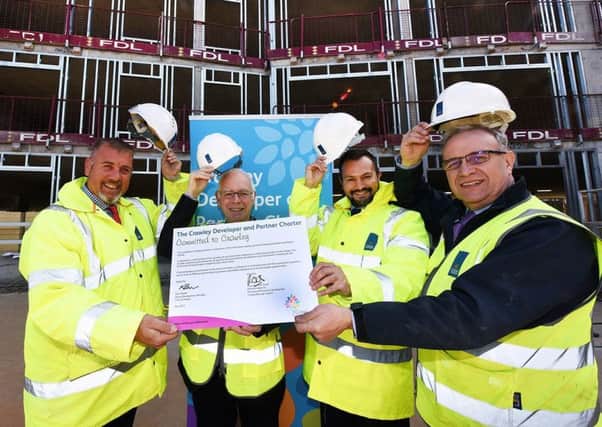 From left: Steve Ames, build manager, cllr Peter Smith, cabinet member for Planning and Economic Development, Kevin Butler, senior development manager and Ray Palmer, build manager. Picture: Jon Rigby