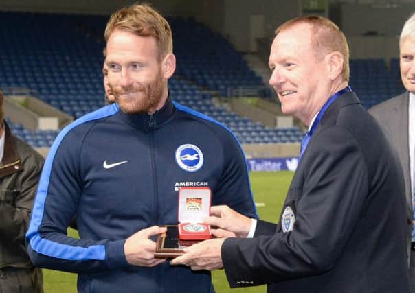 Brighton & Hove Albion under-23 manager Simon Rusk with Sussex FA chairman Mathew Major