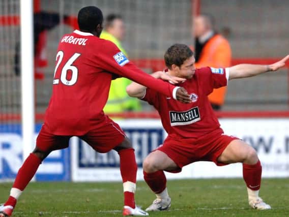 Crawley Town's Dannie Bulman celebrates a goal against Droylsden in 2008