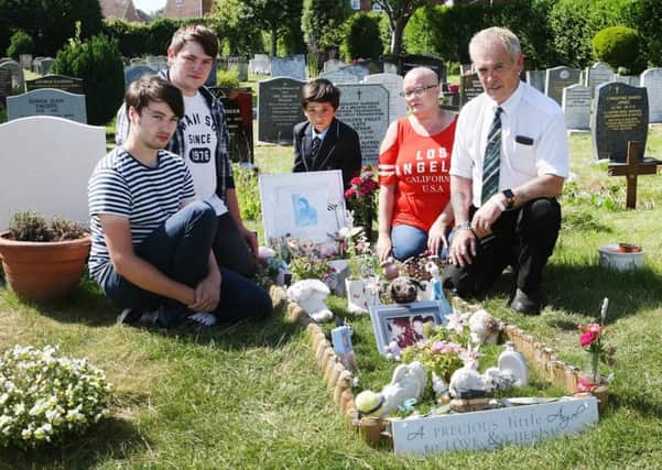 Luke Harley, Sheldon Colwell, Cody Presley, Fiona Presley and Elvis Presley at Kelly Colwell's grave