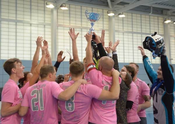Hastings Predators celebrate finishing runners-up at the UK Floorball Federation National Finals.