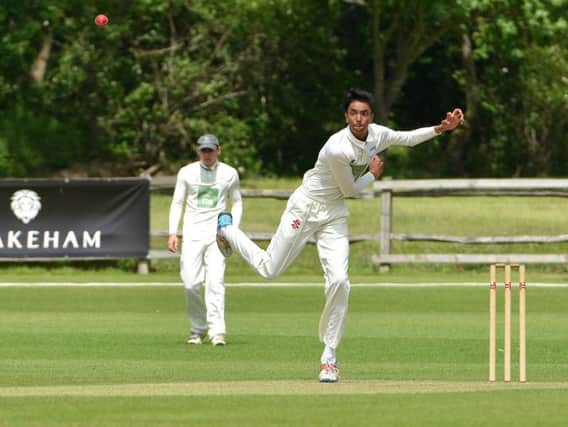 Three Bridges bowler Archit Patel in action against Billingshurst on Saturday.
Picture by Peter Cripps