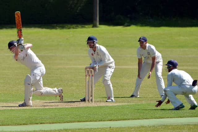 Bexhill's close fielders look on as an Ansty batsman goes on the attack. Picture courtesy Peter Cripps