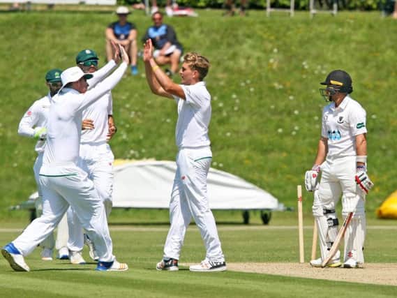 South Africa 'A' celebrate a wicket on the opening day. Picture by Derek Martin