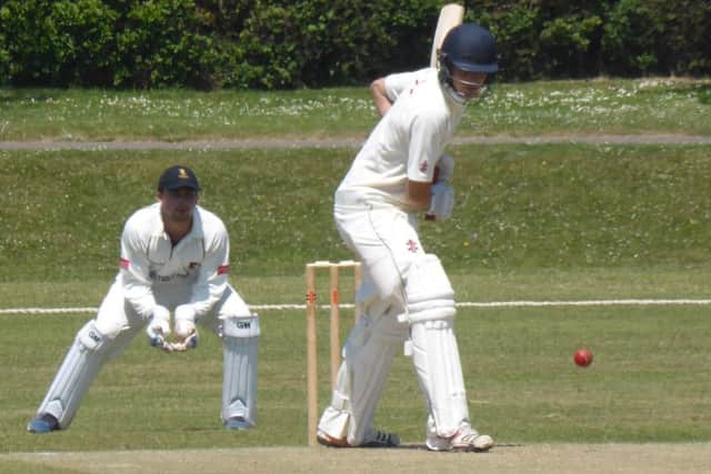 Tim Hambridge lets one go by during the early part of his innings.