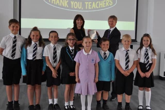 Lorraine Clarke, principal of Ark Blacklands Primary Academy, pictured with Chair of Governors Micky Sandall and some pupils. SUS-170619-131121001