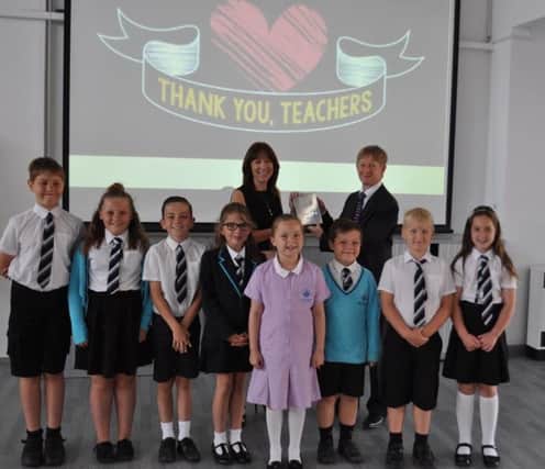 Lorraine Clarke, principal of Ark Blacklands Primary Academy, pictured with Chair of Governors Micky Sandall and some pupils. SUS-170619-131121001