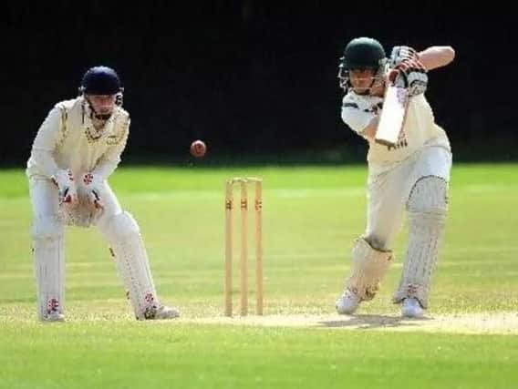 Ifield batsman Paul Clifford goes on the attack.
Picture by Steve Robards