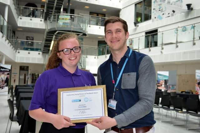 Connie Baker, Outstanding Young Person of the Month, with Sussex Coast College's Ashley Chapman SUS-170621-095105001